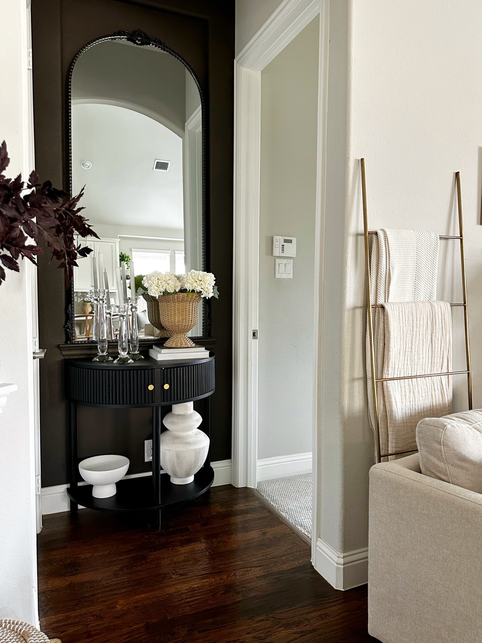 Loving lately - this little hallway moment off our living room 

#LTKHome #LTKStyleTip