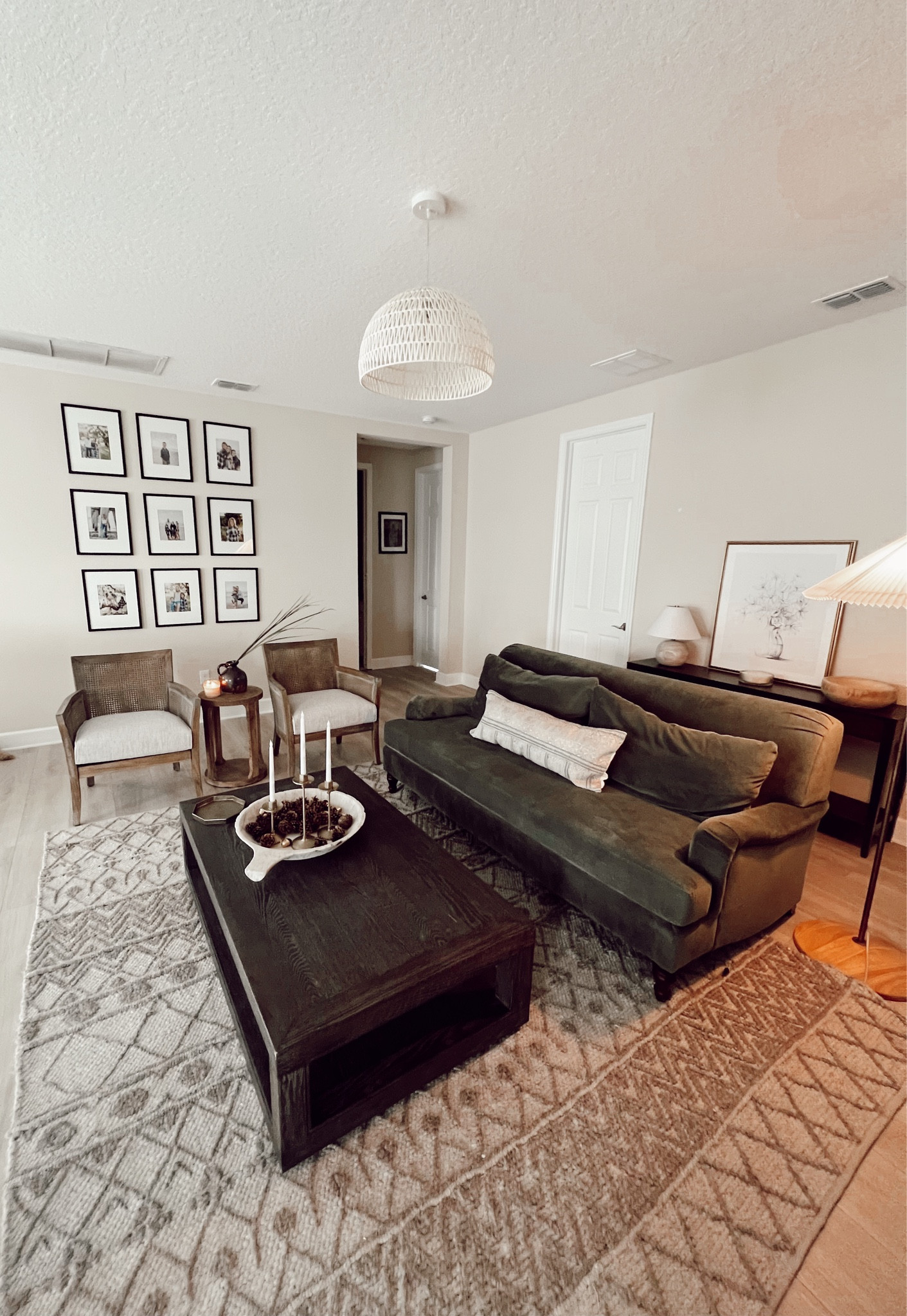 Shop my loft! The area rug is a discontinued rug from Arhaus but I will try to link a similar one. The coffee table and the stone bowl are from RH. I linked the sofa but I do not think the dark olive color is available any longer 

#LTKhome