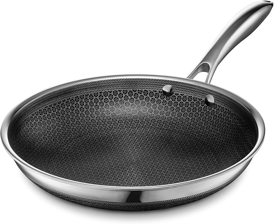 HexClad Hybrid Nonstick Frying Pan, 10-Inch, Stay-Cool Handle, Dishwasher and Oven-Safe, Inductio... | Amazon (US)