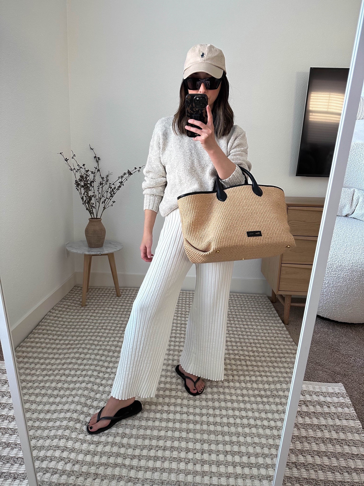 Palm desert travel outfits. Simon Miller ribbed pants. Love these! Elastic waist but sort of snug. 

Hat- Polo Ralph Lauren 
Sweater- Jenni Kayne xxs
Pants- Simon Miller xs 
Sandals- Havianas 5
Tote- Khaite Amelia 
Sunglasses- YSL Mica 

Travel outfit, travel style, spring break outfit, petite style, neutral outfit, minimal style, neutral capsule wardrobe. 

#LTKitbag #LTKFind #LTKtravel