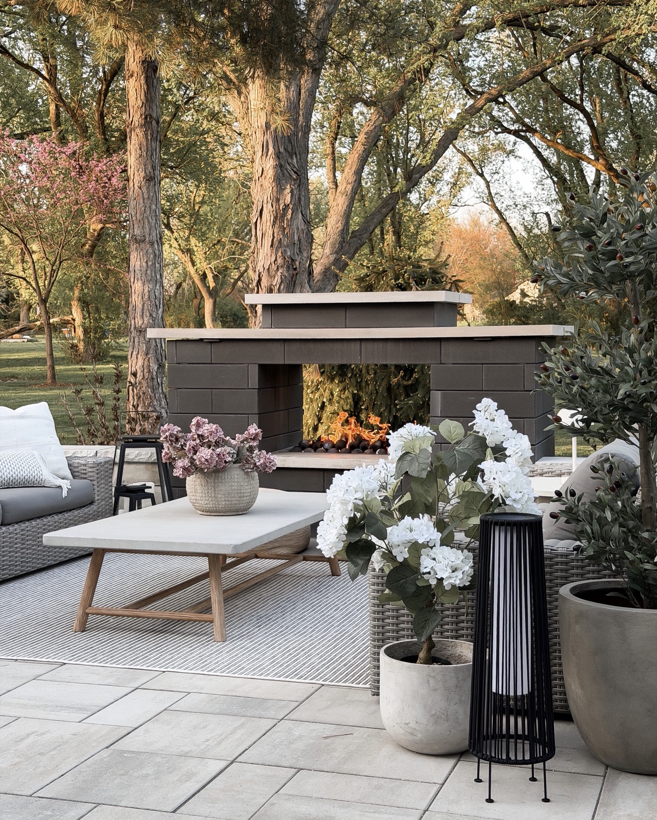 My go-to formula for a cozy patio  using my @Wayfair finds:
outdoor rug + fireplace focal point + planters with height + soft lighting + throw pillows
It doesn’t need to be complicated to feel good out here 🤍 everything linked #WayfairPartner #ad #Wayfair

#LTKSeasonal #LTKHome #LTKSaleAlert