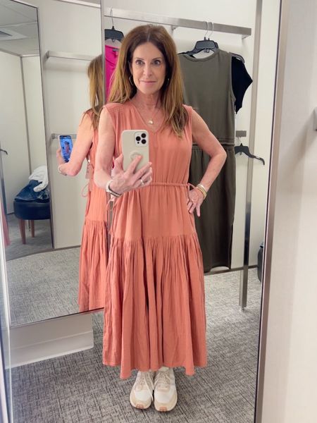 Here's a fun summer dress that you should wear on your next vacation (excuse my sneakers)! This is a pretty terra cotta color. I love the tiers and the ties at the waist. Runs big. I'm wearing an XS. Longer on me at 5'2".
#outfitidea #trendydresses #onthegolook #womenover50

#LTKover40 #LTKstyletip #LTKSeasonal