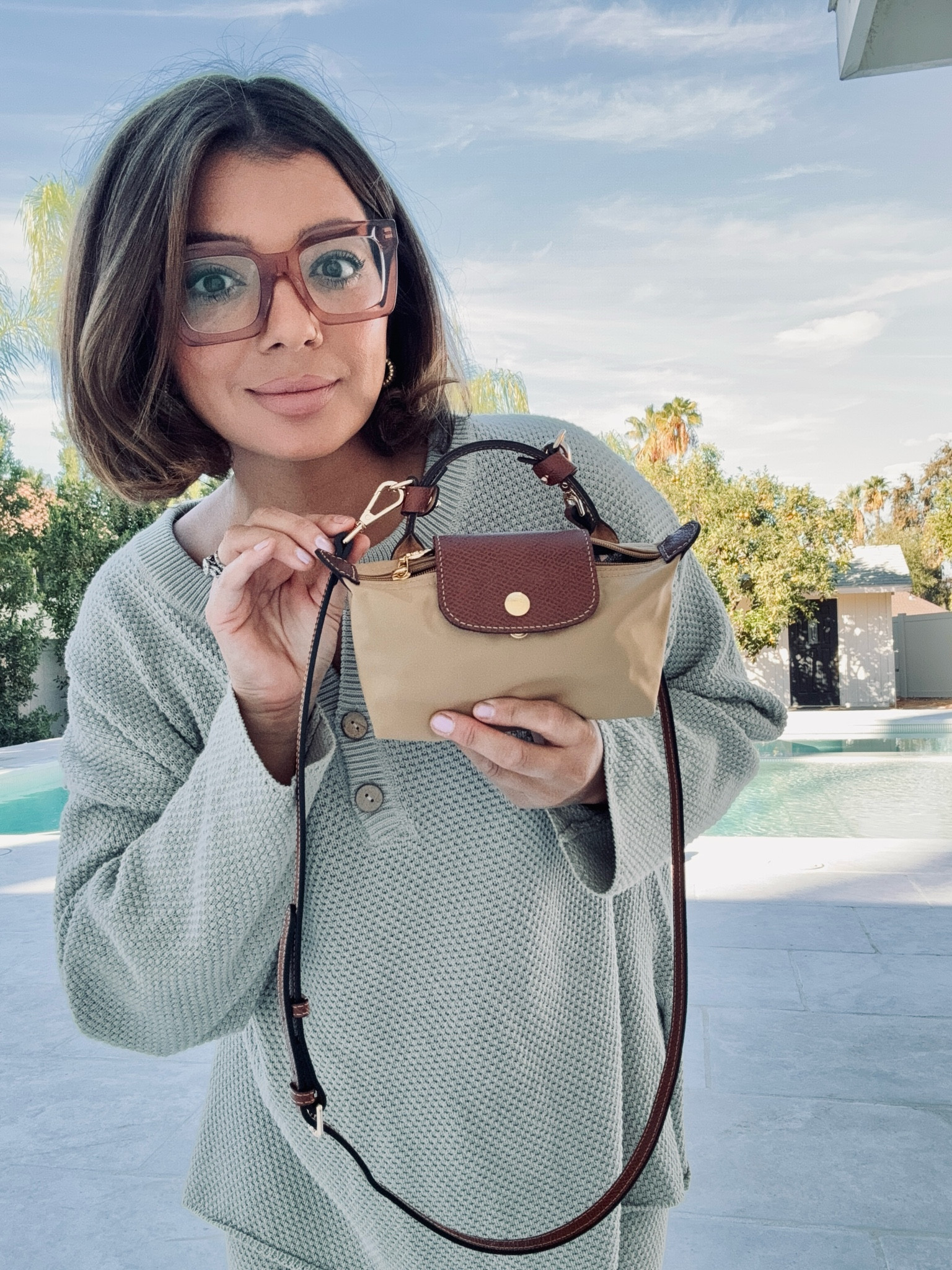 The Longchamp mini cosmetic bag. 
The perfect little bag to carry all your necessities. 
I found the perfect strap to add to make it a to-go or cross-body bag! 

#LTKCyberWeek #LTKGiftGuide #LTKHoliday
