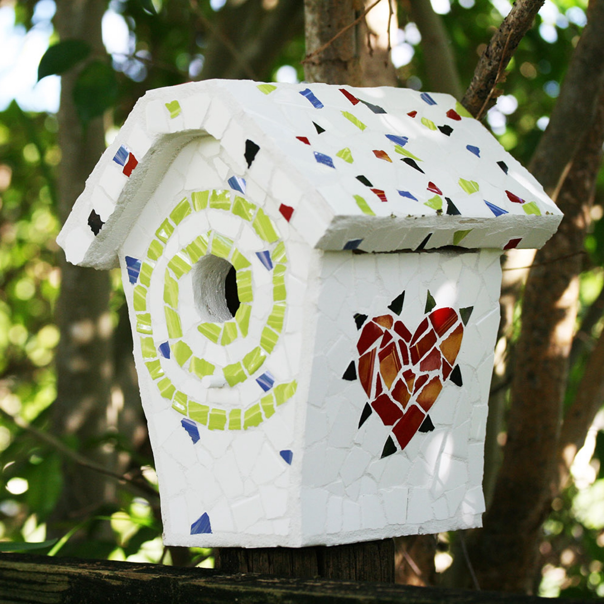 This decorative mosaic birdhouse is covered in hand-cut tile, plates, bowls, and cups. ❤️ Please note: the birdhouse was outside for photography reasons only.  It should not be kept outdoors. ❤️ For mosaic tips, tutorials, inspiration, and so much more please visit my YouTube channel: YouTube.com/julieweilbacher. Follow @julieweilbacher on Instagram for all things mosaic art. birdhouse - decorative birdhouse - mosaics - mosaic birdhouse - spring decor - shelf decor - spring tablescape

#LTKhome #LTKSeasonal