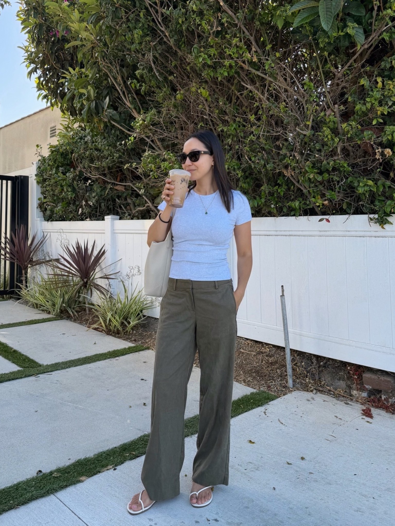 Coffee run in LA - casual ootd 

Aritzia tee small, quality ribbed tee that’s not too long 
Banana Republic everyday pants xs petite (this green color runs bigger than the other colors - otherwise small fits better in the other colors)