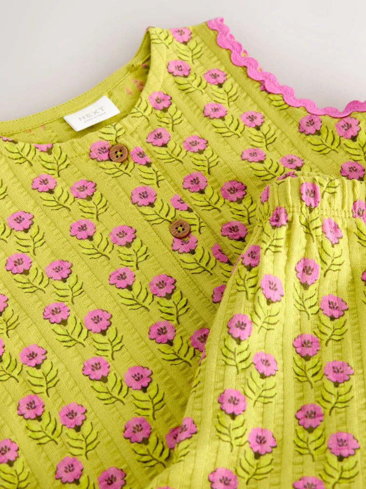 Buy Green/Pink Flower Peplum Vest and Shorts Set (3mths-7yrs) from Next USA | Next US