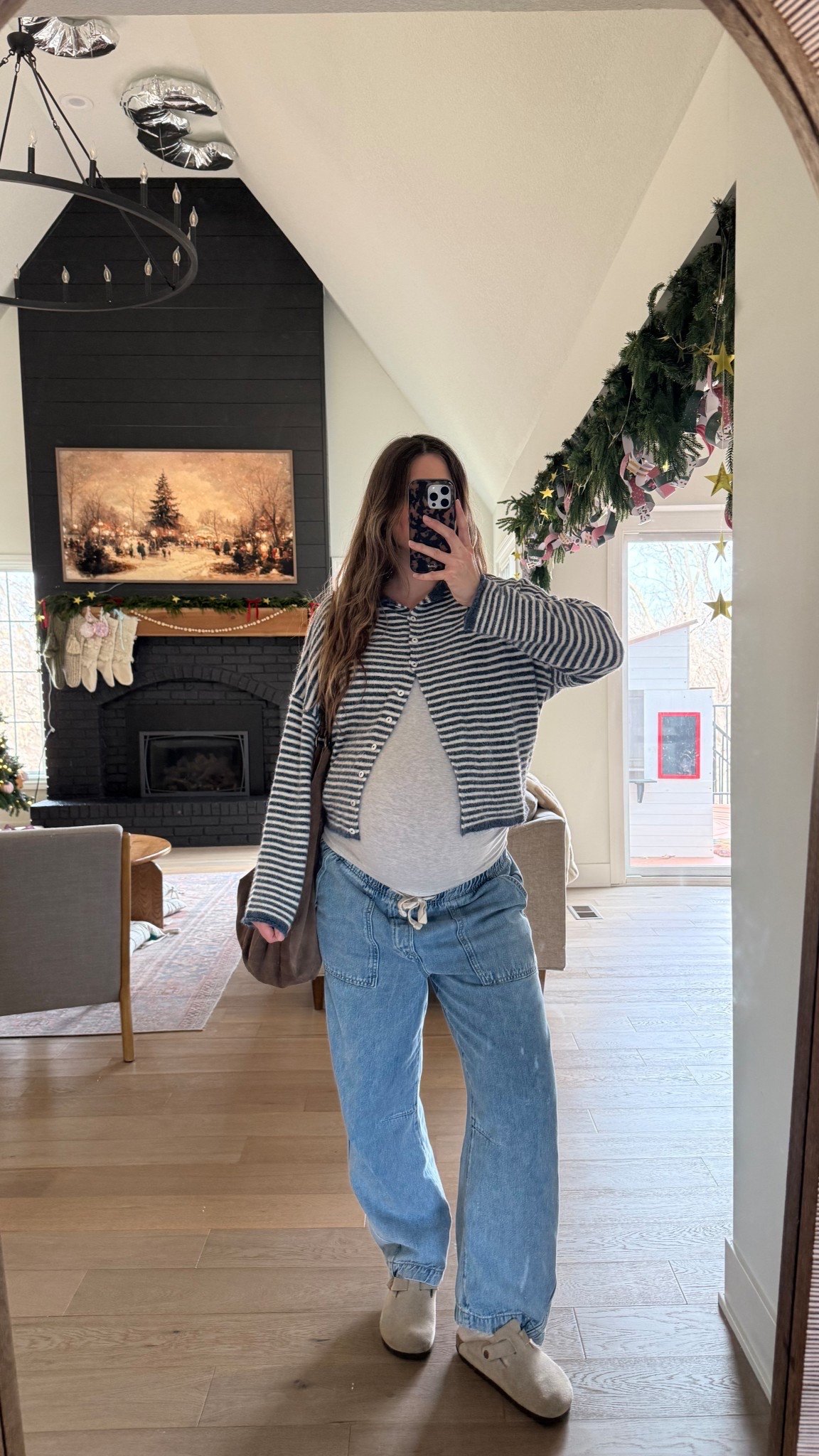 wearing a small in cardigan and maternity tee! Sized up in barrel jeans but small would have been fine! 

#LTKBump #LTKootd