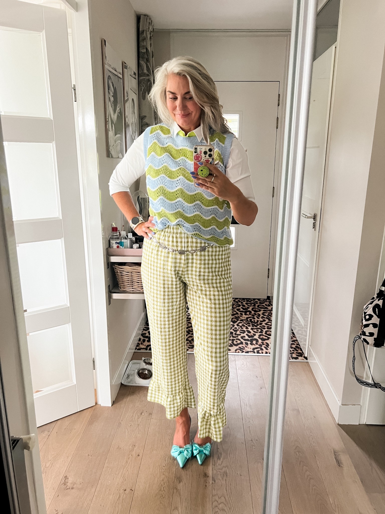 Ootd - Sunday. Green gingham ruffle hem trousers (L) paired with a basic white shirt (XL), a blue and green crochet top (XL), green ribbon around my neck and blue metallic bow slingback heels (Shoeby). 

#LTKnederlands #LTKeurope #LTKsummer