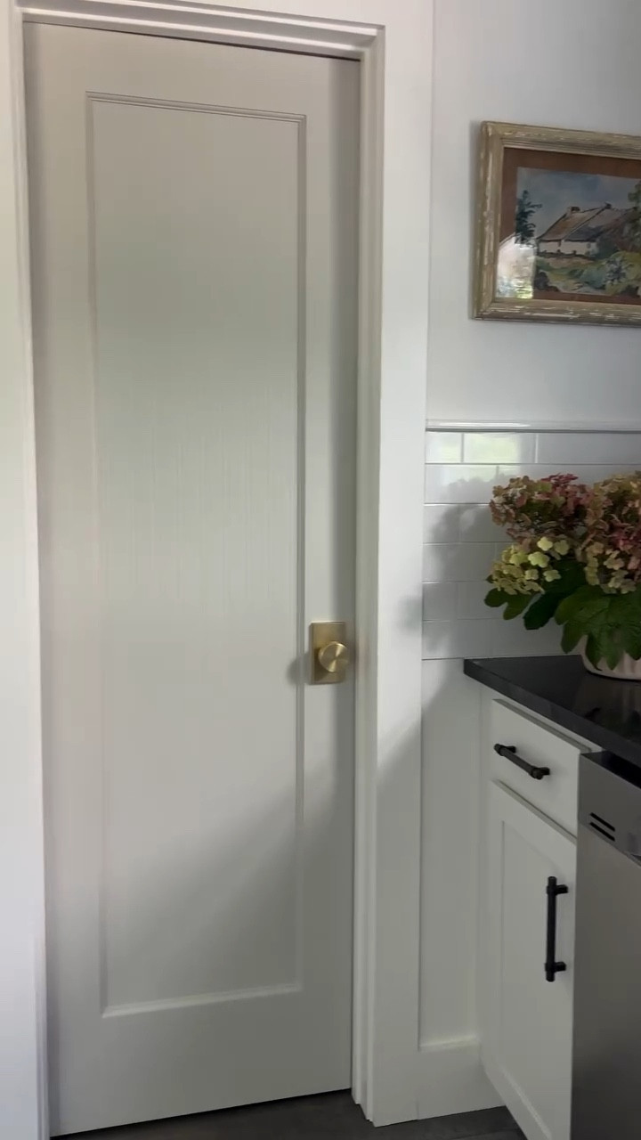 From tacky 👉 to timeless. 🤩

I’ve never been a fan of the builder-grade pantry door in our kitchen but didn’t want to pay hundreds for a new one in the custom size we needed. The solution? Paintable beadboard wallpaper. 🎉 Here’s how I achieved this classic look in less than a day for under $50 all-in.👇

1. Cut wallpaper to size 
2. Apply @loctiteglue spray adhesive to the the glass and the back of the wallpaper, taking care to cover/protect surrounding surfaces. Don’t be like me and end up scrubbing glue off the floor. 
3. Hang paper while the door is vertical. 
4. Optional: remove door and lay on sawhorses, being careful not to press against the paper as it will crease. 
5. Caulk around the edges. 
6. Paint and change hardware. 

NEED-TO-KNOWS:
✨ Pre-pasted wallpaper doesn’t stick to glass, so I found an adhesive that works for both paper and glass. It’s workable for up to 10 minutes which made hanging the paper super easy. 
✨Hang the paper while the door is still vertical BEFORE you take it down to caulk and paint. It’s much harder to apply to a flat surface. 
✨Don’t leave the door to dry in a non-temperature controlled environment like a garage. It will bubble up. 
✨This wallpaper is paintable and scrubbable! 

Everything I used is linked!

after

#LTKHome #LTKFindsUnder50