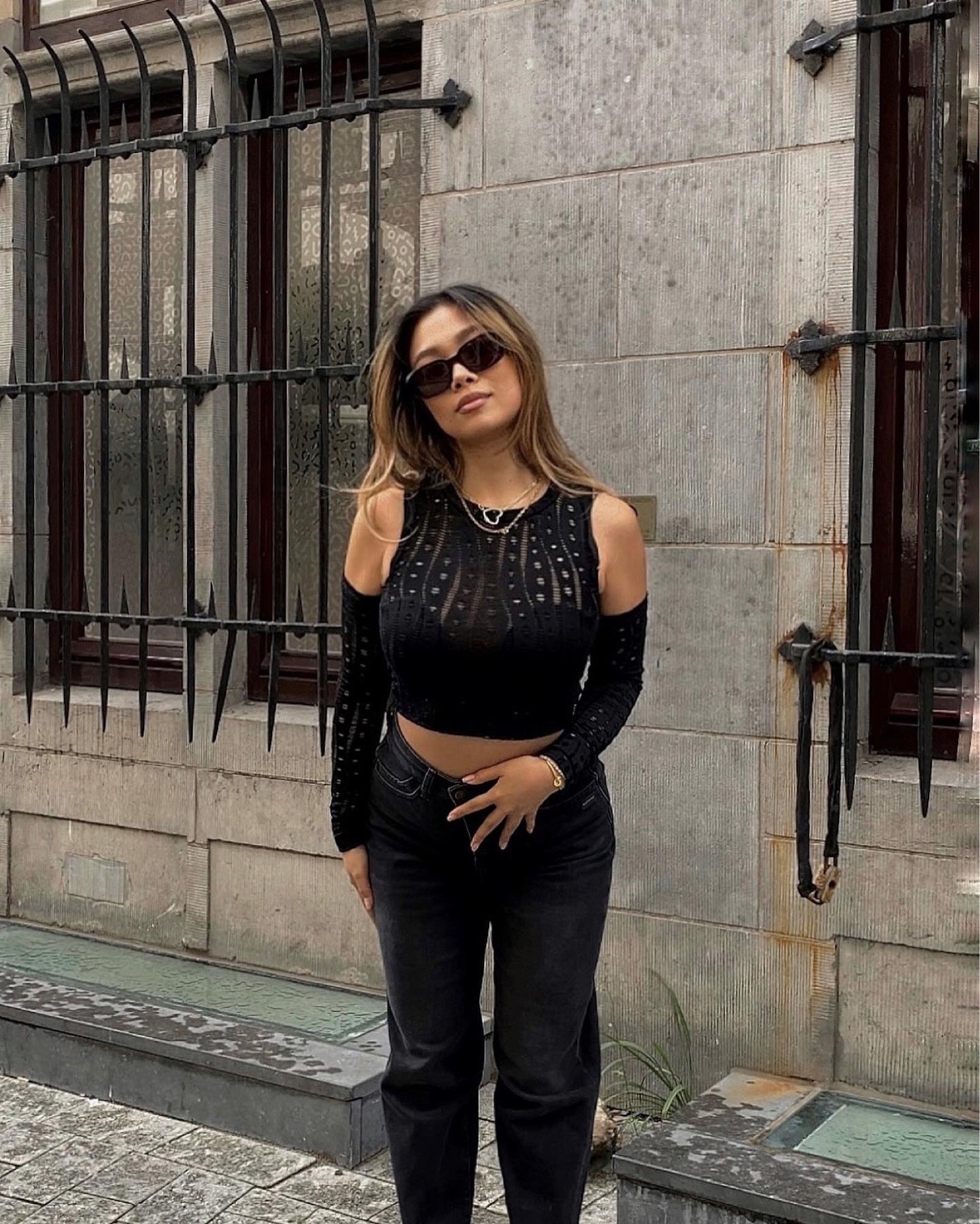 In my Y2K area 🖤 Simple but making it edgy with the top and sleeve details

#LTKeurope #LTKSeasonal #LTKfamily