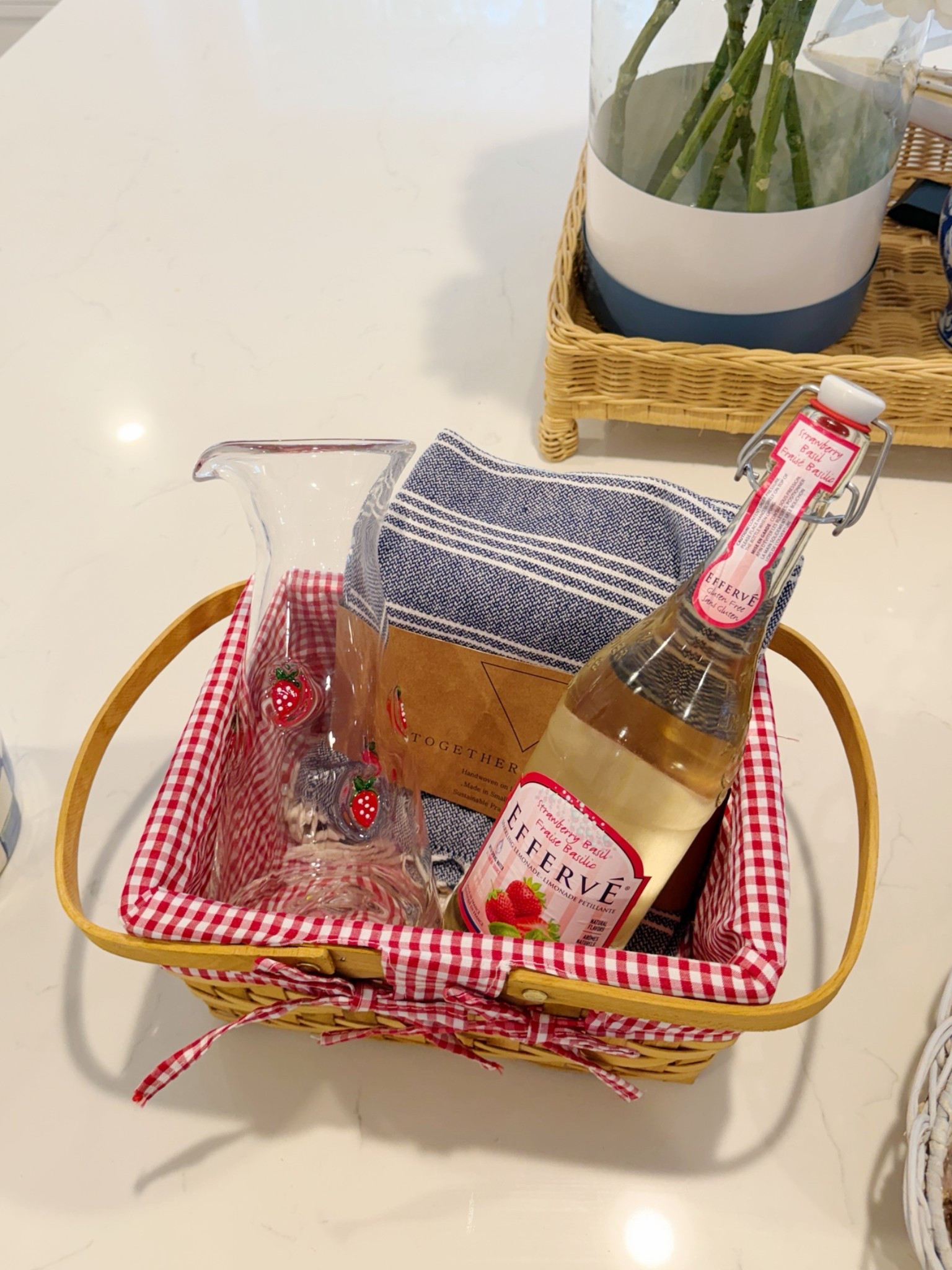 Strawberry themed summer hostess gift! Pair this cute basket with some sparkling lemonade, strawberry carafe and Turkish towel! 🍓