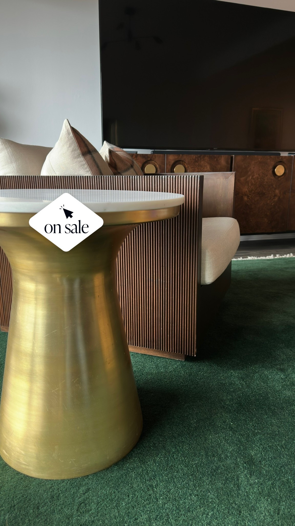 I am all about mixing high and low to create a space that feels curated and expensive. Between the richness of the burl wood console, and that deep forest green rug, this corner was missing one thing: a touch of brass & marble. This table provides the perfect sculptural element and it’s currently 20% off!

#LTKHome #LTKSaleAlert