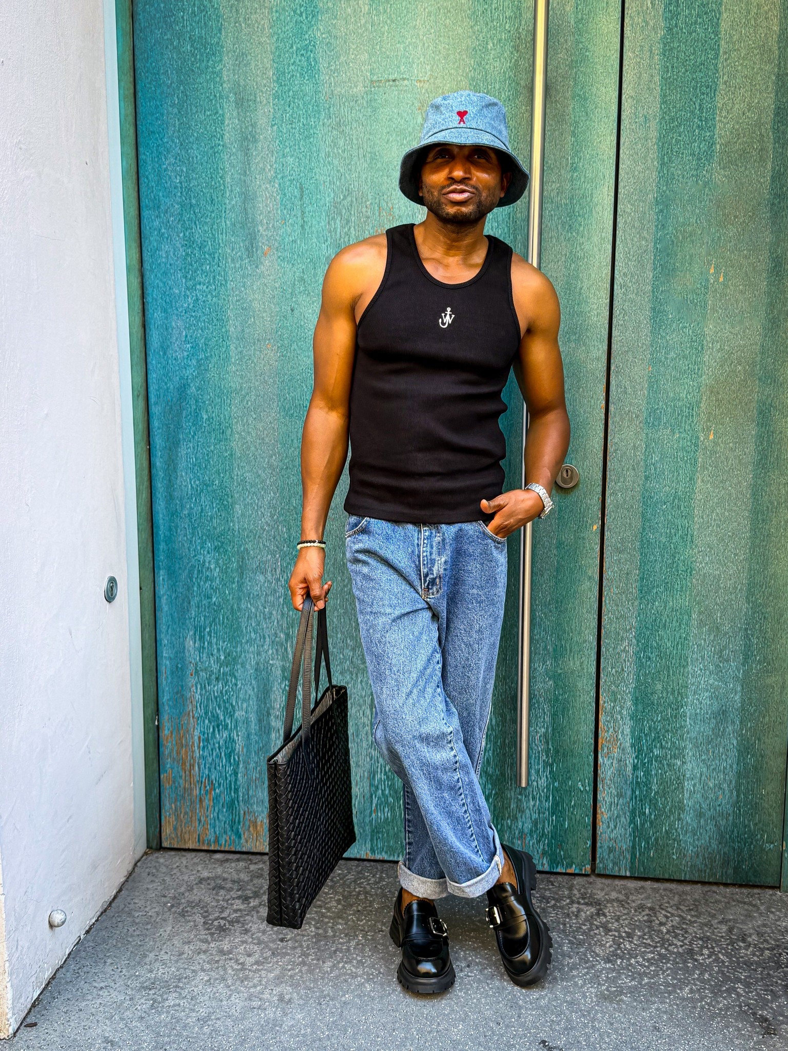 
I wore a black tank top from JW Anderson, blue jeans I found at a thrift store, and black chunky Alexander McQueen loafers. I selected a black tote from O My Bag Amsterdam as my preferred bag and complemented the look with a two-fragrance combination. #GayIgboStyle #QueerAndNigerian #AfroQueerVoices #IgboGayRoyalty #BlackQueerElegance #UnapologeticallyQueer #VisibleAndVulnerable #QueerAndUnbothered #MyOwnKindOfRunway #BoldBlackStyle #GayAndThriving #QueerFashionDiaries #StreetStyleWithPower #FashionAsResistance #TooMuchIsPerfect

#LTKjeans #LTKeurope #LTKtravel