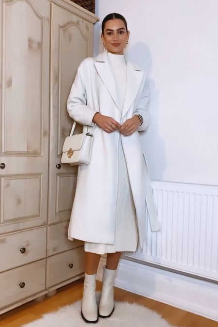 All white early spring outfit idea 🤍

White coat, white knit midi dress, white boots, Maje clover bag

#LTKstyletip #LTKSeasonal