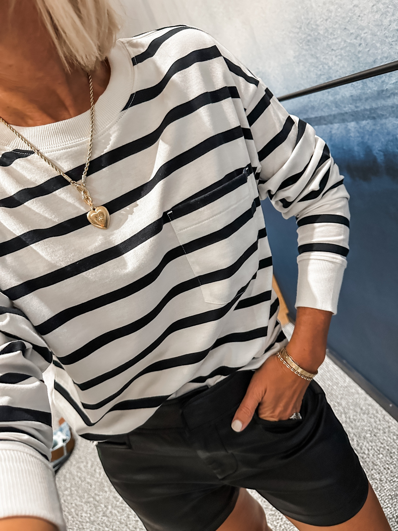 Seasonal transition 
Long sleeve tee in my true size xs
Faux leather shorts- so cute, they do run small- I did my bigger size denim 25

#LTKOver40 #LTKSeasonal #LTKStyleTip