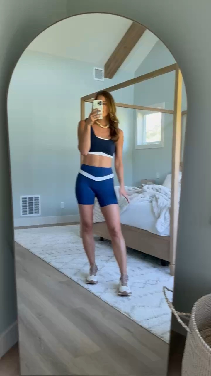 The contrast trim makes this active set so good. I love the sporty navy and white combo, and the high rise biker shorts with the matching bra make it an easy set for workouts or walks.

Size L

Matching active set, Biker shorts, Sports bra, Navy workout set, Workout outfit, Tall girl activewear, Athleisure outfit, High rise biker shorts, Gym outfit, Activewear finds, Fitness style, StangandCo

#LTKActive #LTKootd #LTKTall