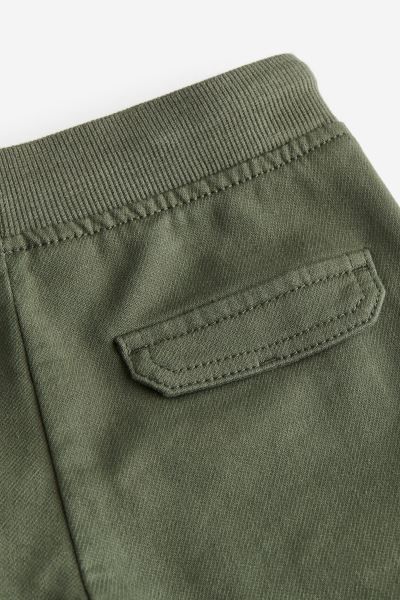 Slim fit cargo trousers - Dark khaki green - Kids | H&M GB | H&M (UK, MY, IN, SG, PH, TW, HK)