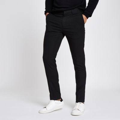 Black skinny fit smart pants | River Island (US)