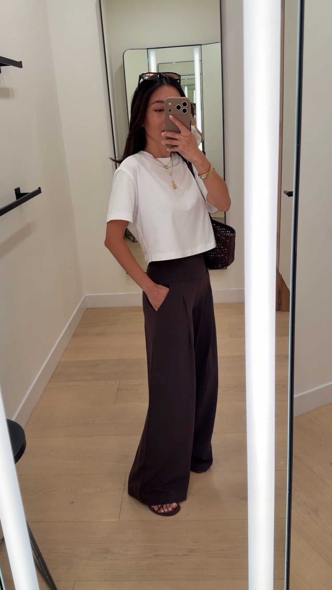 Softest Align Palazzo Pant size 2 in Short (29.5" inseam), I would use their free hemming to wear with flats 
• Organic Cotton-Blend Cropped T-Shirt XXS 
• Reformation sandals 5.5 
• Madewell bag and sunglasses 

Easy mom outfit, athleisure, walks, mom school pickup

#LTKPetite #LTKTravel #LTKmomlife