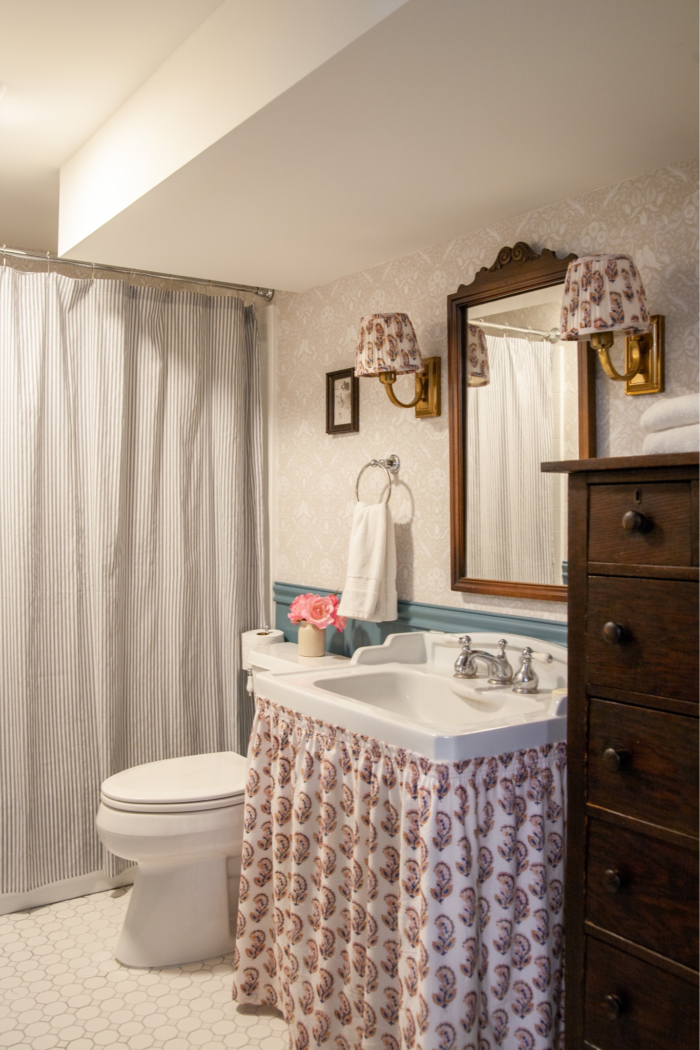 This is the last room I designed (/installed/finished) and is more representative of my current style than a lot of the other rooms in my house like the kitchen and main bathroom of 2019, but it’s in the basement and when the TV show was filming they didn’t even consider filming down here because it’s not connected to the main part of the house so the flow wouldn’t work. ☹️ Well, here it is for you again.
Antique store mirror, FB dresser, Amazon lights and towel bars, DIY pleated shades and sink skirt. Linked what I could in the @shop.ltk app!

#LTKhome