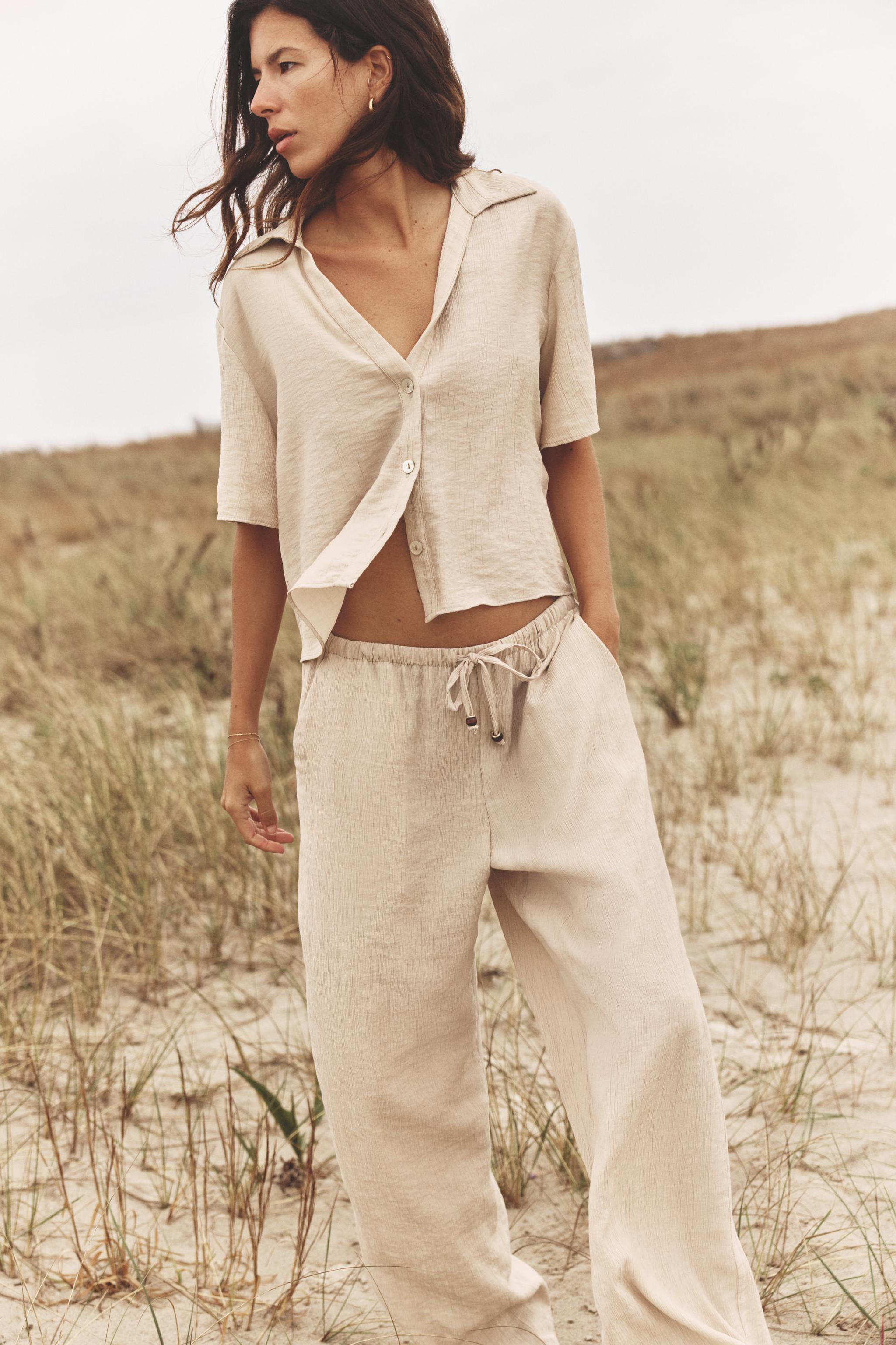 WIDE-LEG TROUSERS WITH ELASTIC WAISTBAND | Zara UK