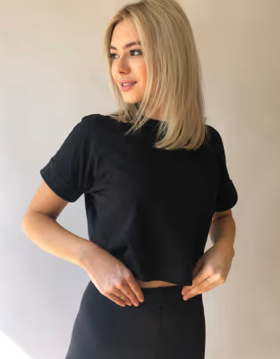 ASOS DESIGN crop t-shirt with roll sleeve in black | ASOS (Global)