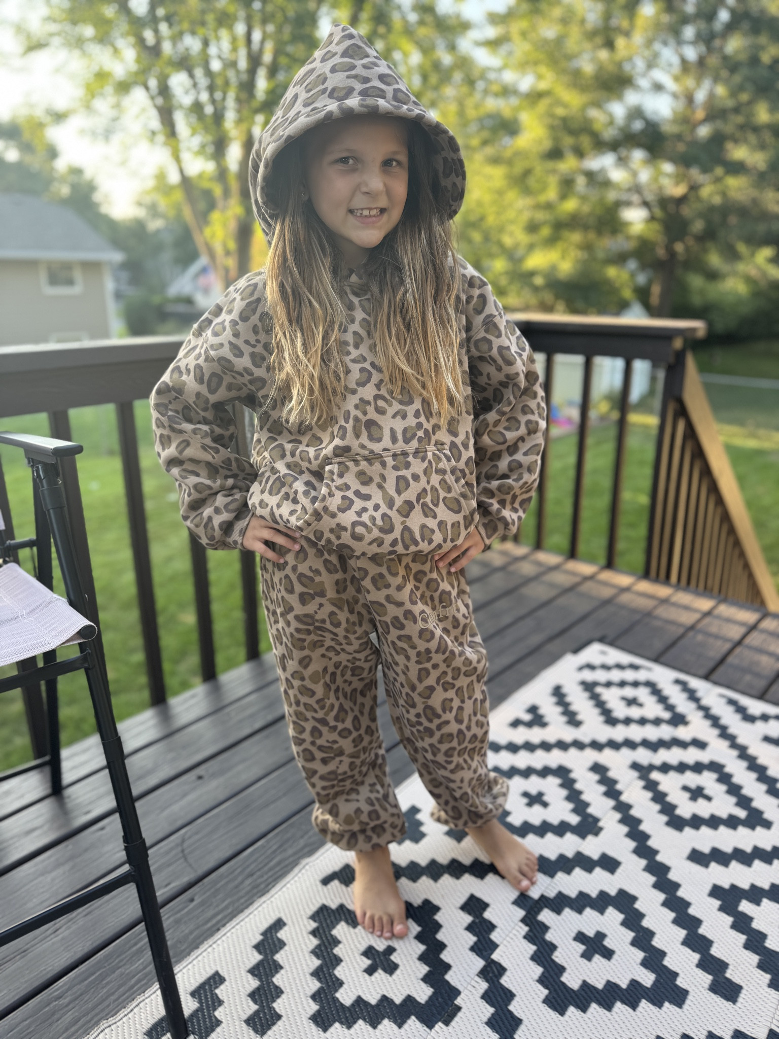 Comfrt outfits are perfect for the Minnesota weather! Remmie is wearing Youth Medium and loves this leopard set. 

 