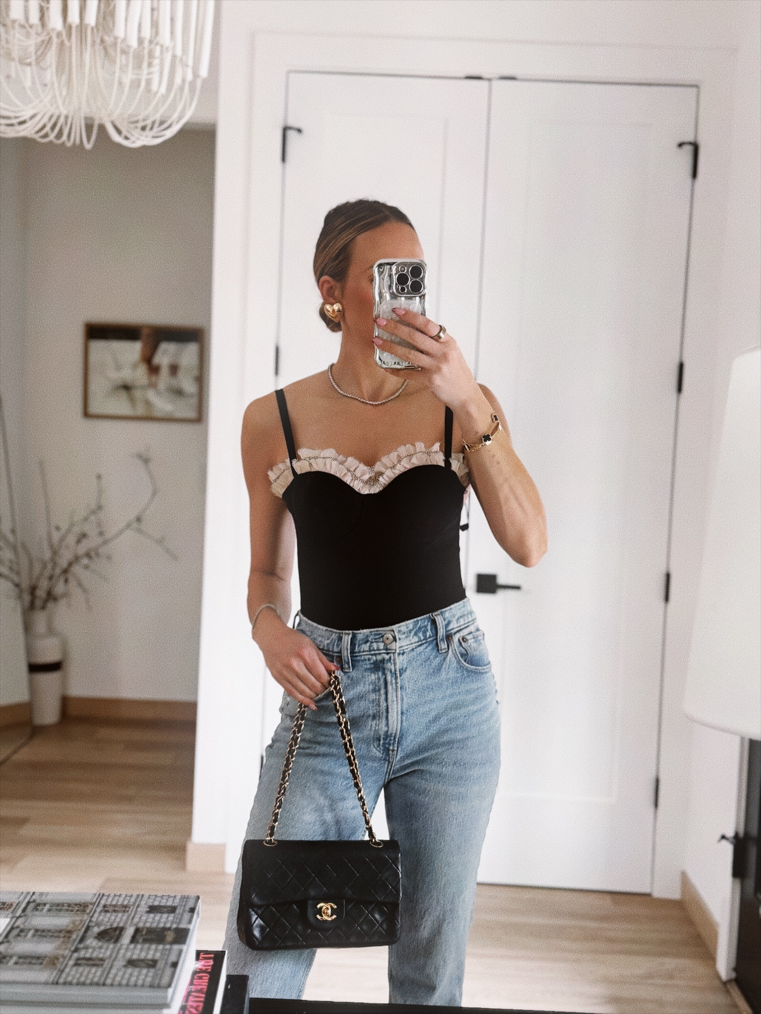 Wearing a small in the top. Jeans run TTS.

#LTKover40 #LTKparties #LTKMostLoved