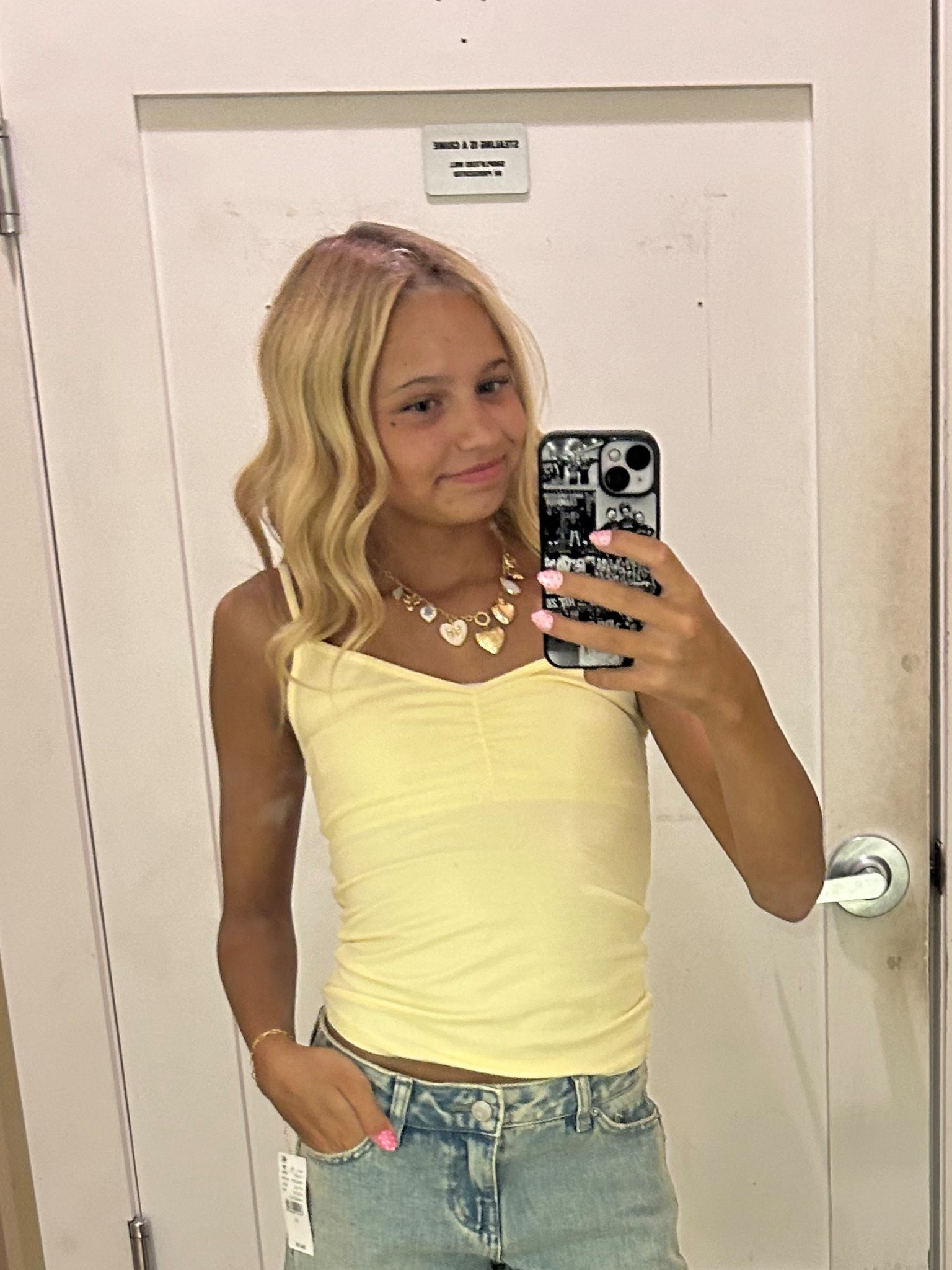 The Yellow Tank Top 
versatile solid color wash with a flattering V-neckline. Featuring cinched front detail and thin fixed straps, this slim fit tank top adds a chic touch to any outfit.

Solid color tank top
V-neckline
Cinched front detail
Thin fixed straps
Slim fit
96% cotton, 4% spandex
Machine washable
One size fits most