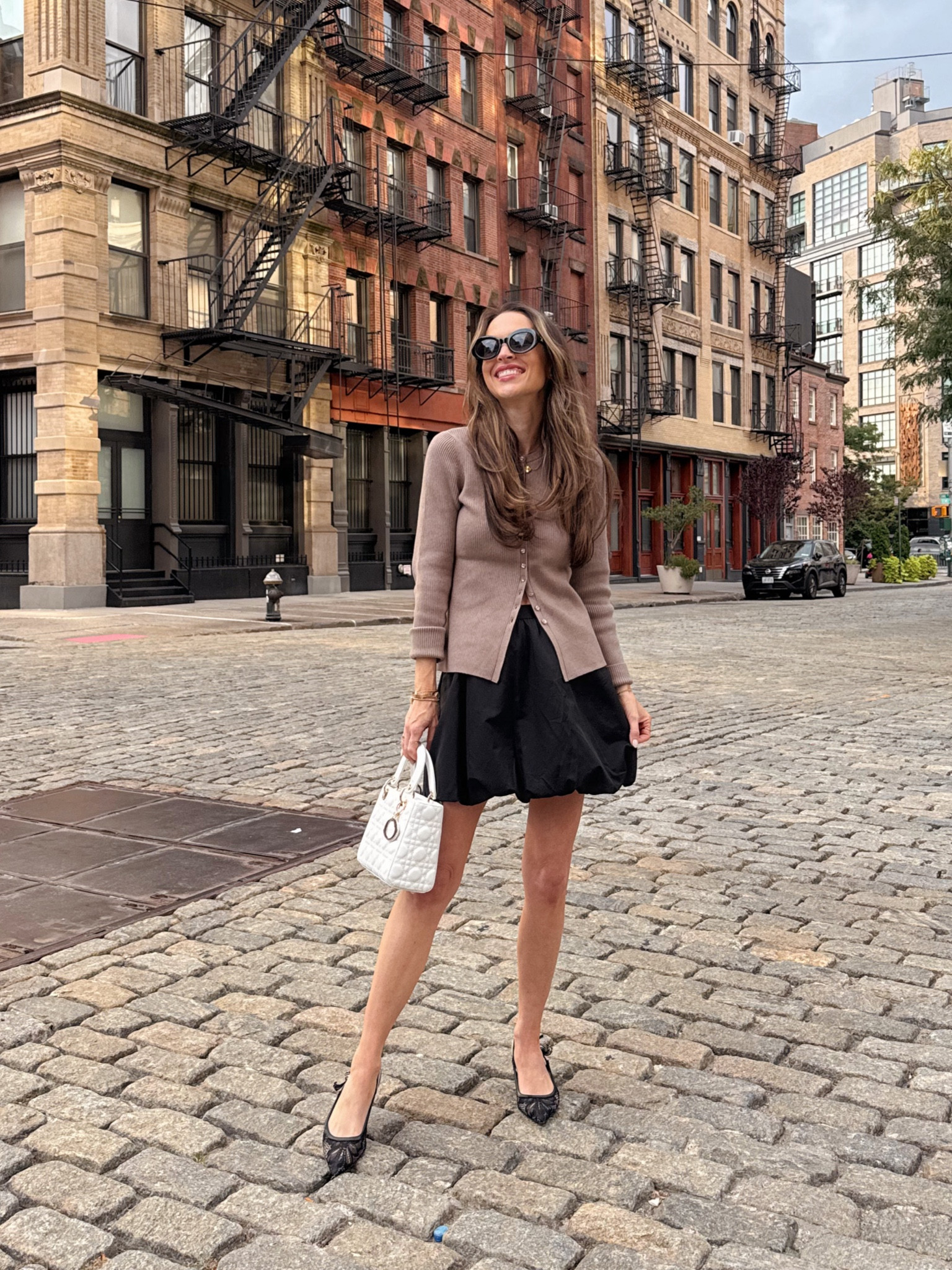 LTK X NYFW, wearing this $25 bubble skirt (runs true to size, wearing XS) and cardigan (runs true, wearing XS). And my kitten heels are so comfortable and under $35! So perfect for the holiday season too! 

#LTKNYFW #LTKSeasonal #LTKFallSale