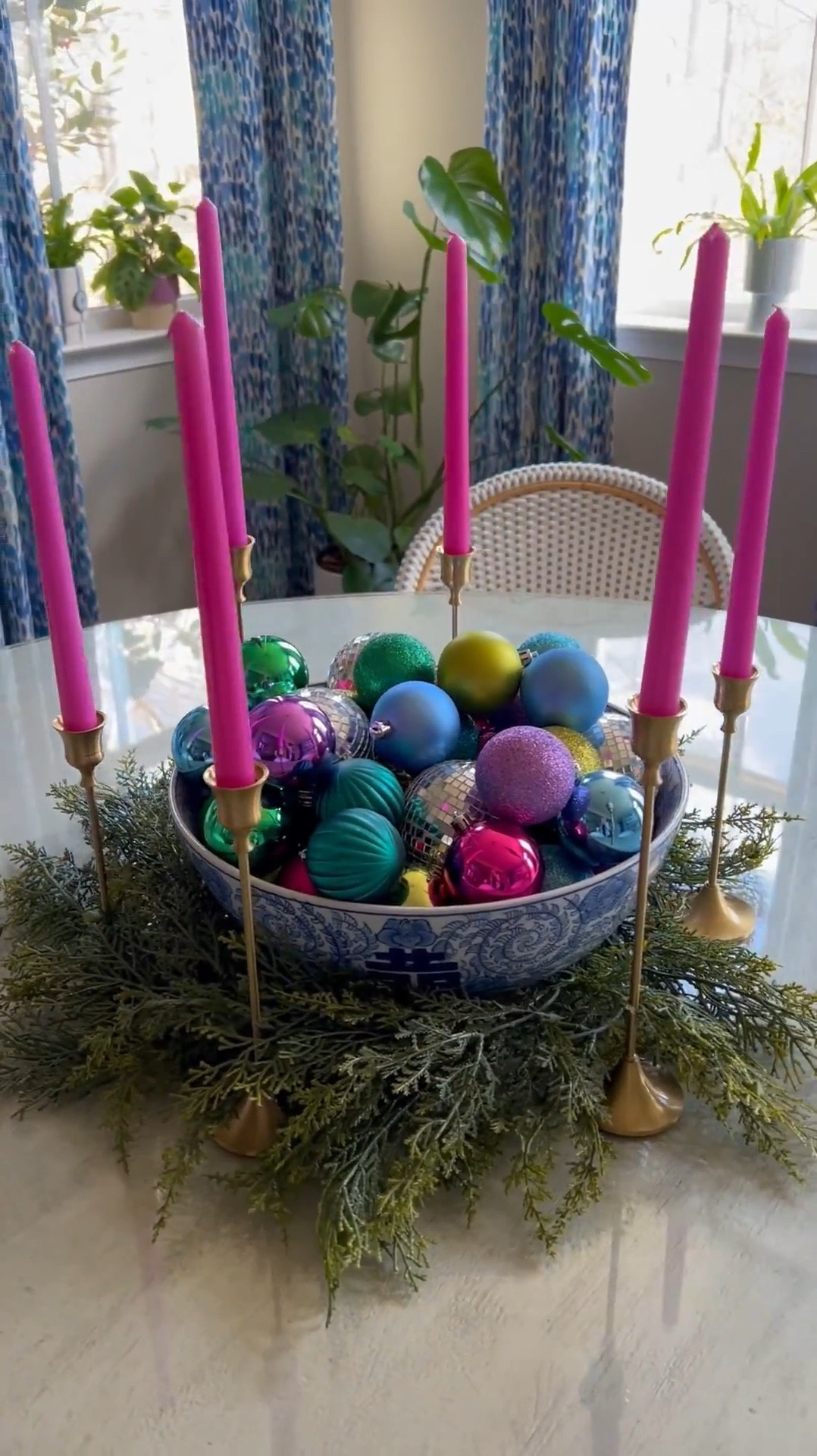 Colorful Christmas centerpiece 🩷🎄 The perfect centerpiece for your holiday table! I used 1 garland to wrap around the bottom of the bowl and 2 of each size taper candle holder. 

#LTKHoliday #LTKHome #LTKSeasonal