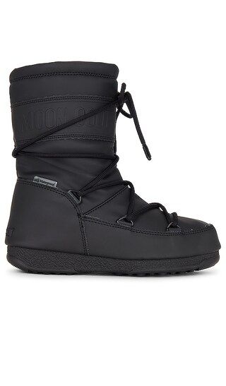 Mid Rubber Boot in Black | Revolve Clothing (Global)