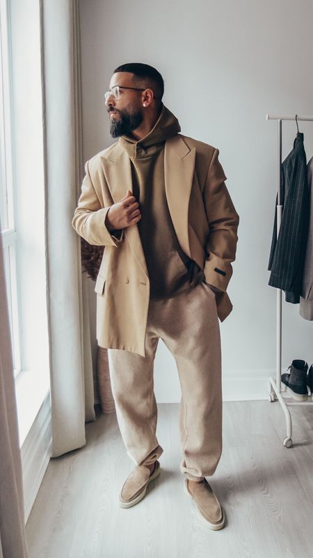 FEAR OF GOD 7th Collection California Blazer in ‘Camel’ (size 48), The Vintage Hoodie in ‘Vintage Mocha’ (size M), and The Loafer in ‘Daino’ (size 41). ESSENTIALS Cable Knit Sweater in ‘Cream’ (size M) and Sweatpants in ‘Core Heather’ (size M). FEAR OF GOD x BARTON PERREIRA glasses in ‘Matte Taupe’. A relaxed and elevated look that features formal and casual pieces, for a night out. Linked similar items where exact items are sold out. Many pieces are currently up to 40% off on sale.

#LTKstyletip #LTKsalealert #LTKmens
