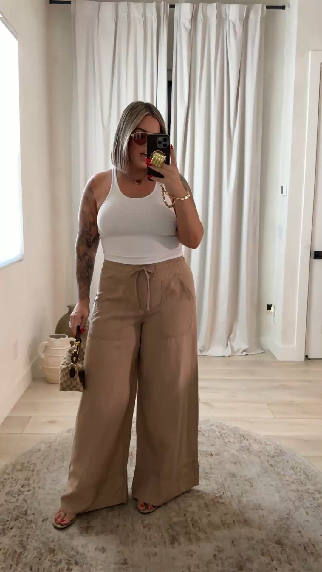A linen pant that fits extreamly well. Nice and long in in the regular length. 

Pants L reg 
Tank M