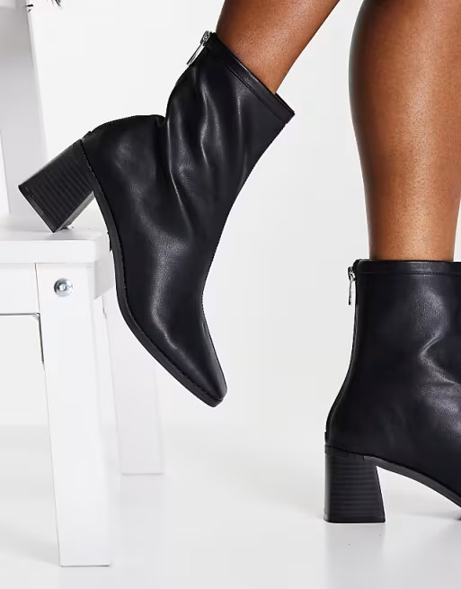 ASOS DESIGN Raider mid-heel ankle boots in black | ASOS (Global)