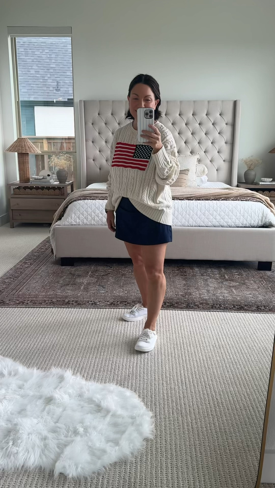 Memorial Day outfit idea. Casual everyday outfit idea with a lightweight sweater + mini skirt combo that’s perfect for summer to fall transition. The flag sweater is from Target and such a good relaxed fit, paired with an Amazon mini skort and classic white sneakers for an easy, everyday look. This is one of those outfits you can throw on and still feel put together whether you’re running errands or grabbing coffee. I sized up on sweater for more of an oversized fit. Skort runs TTS. Follow me on LTK for daily outfit ideas, Amazon finds, and effortless style.

#LTKootd #LTKvlog #LTKSaleAlert