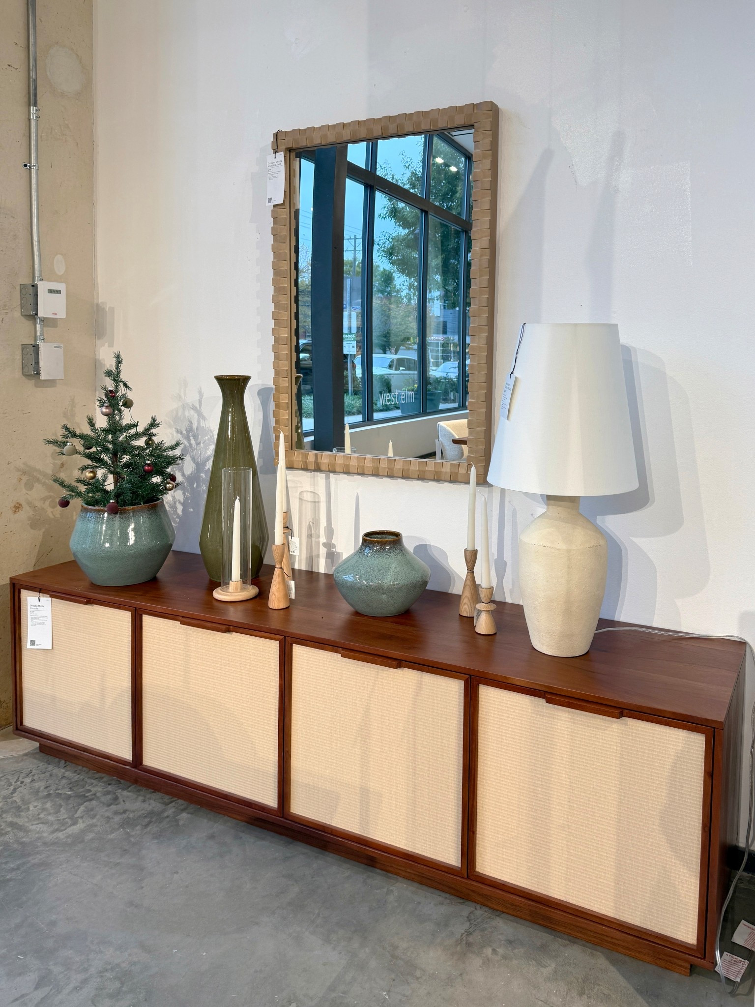 Simple, modern, and effortlessly stylish! ✨ The Douglas Solid Wood Tatami Media Console is such a clean, elevated piece — woven tatami texture, integrated handles, and plenty of hidden storage. Paired here with the Cantilever Textured Wood Wall Mirror for that sleek West Elm vibe. Linked everything on LTK! 🤎#Sideboard #ModernHome #WestElm

#LTKSaleAlert #LTKHoliday #LTKHome