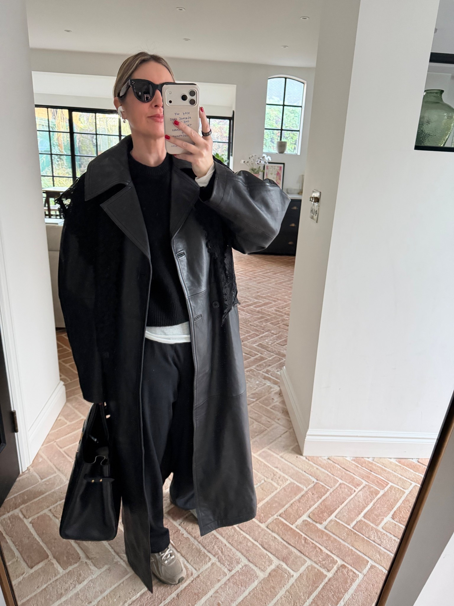 Leather Trench Coat + Black Trousers + Sneakers 

#LTKuk #LTKeurope #LTKstyletip