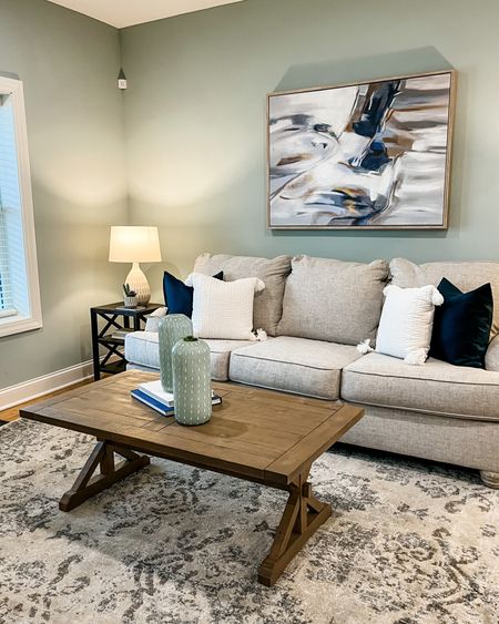 Furniture, soft goods, and decor to complement a blue family room. We love the wood tables to complement the color tones and bring warmth to the space. 

#LTKfamily #LTKstyletip #LTKhome