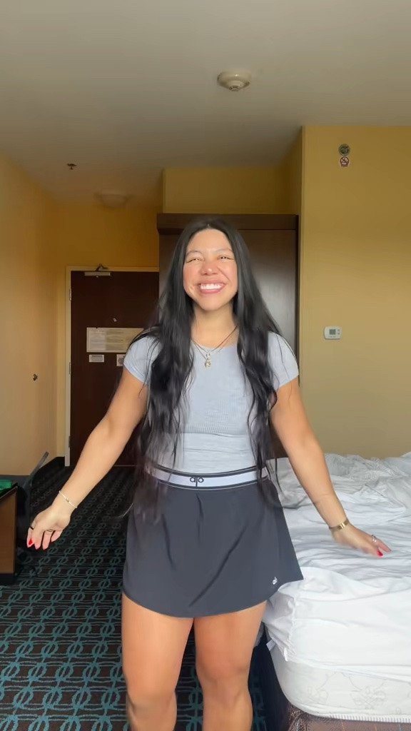 little dallas ootd day two ✨🤍

- alo yoga black match point skirt 
- nike al8 sneakers