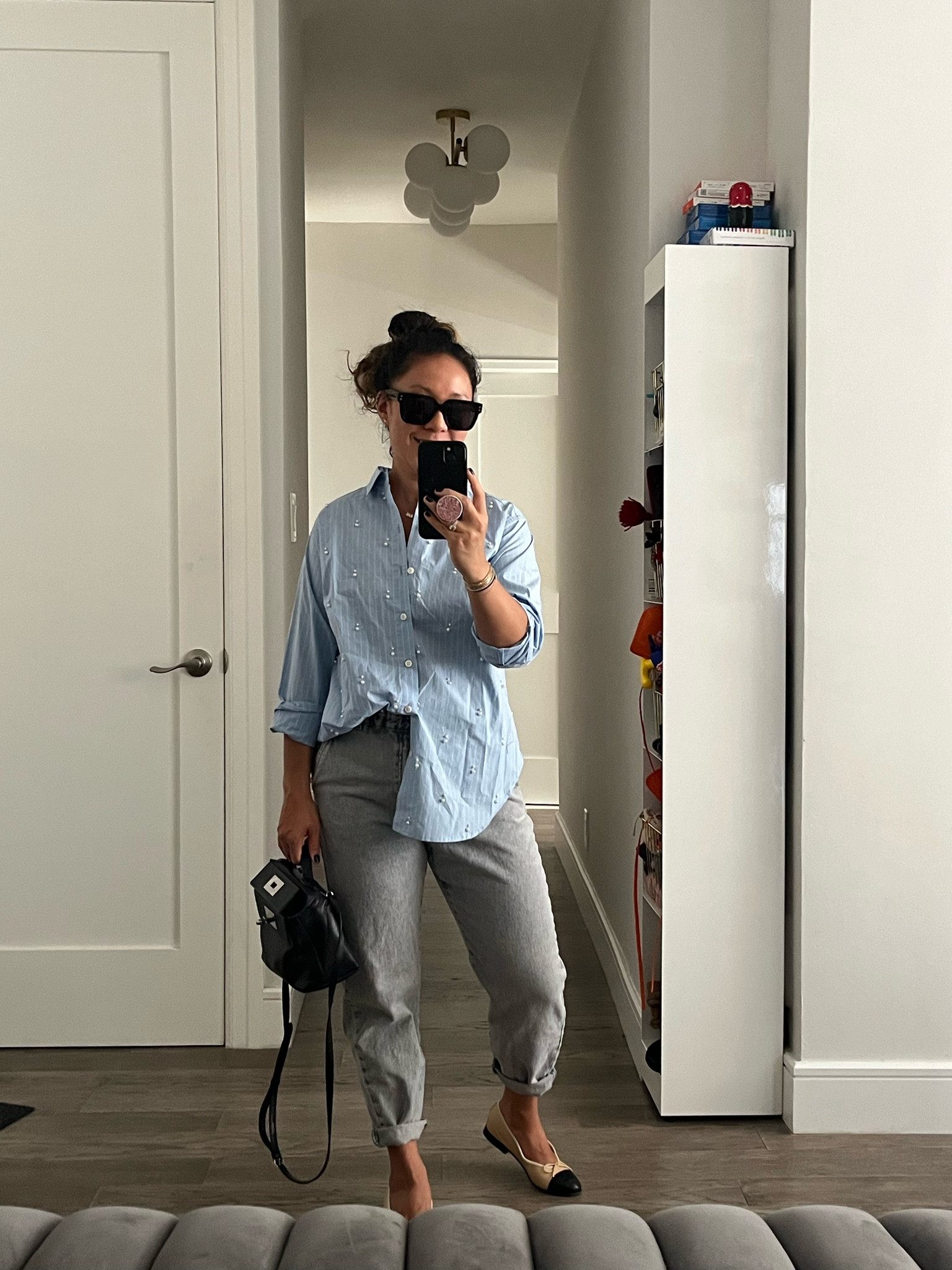 Oversized button down shirt. Pearl detail. I’m wearing an xxs. Jeans are Zara sale. High low fashion.

#LTKTravel #LTKItBag #LTKFindsUnder50