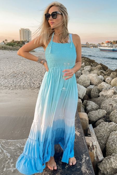 The perfect vacation dress that you will want to add to your next trip. It is so flattering fits true to size. Perfect for family pictures.

#LTKFindsUnder100 #LTKOver40 #LTKSwim
