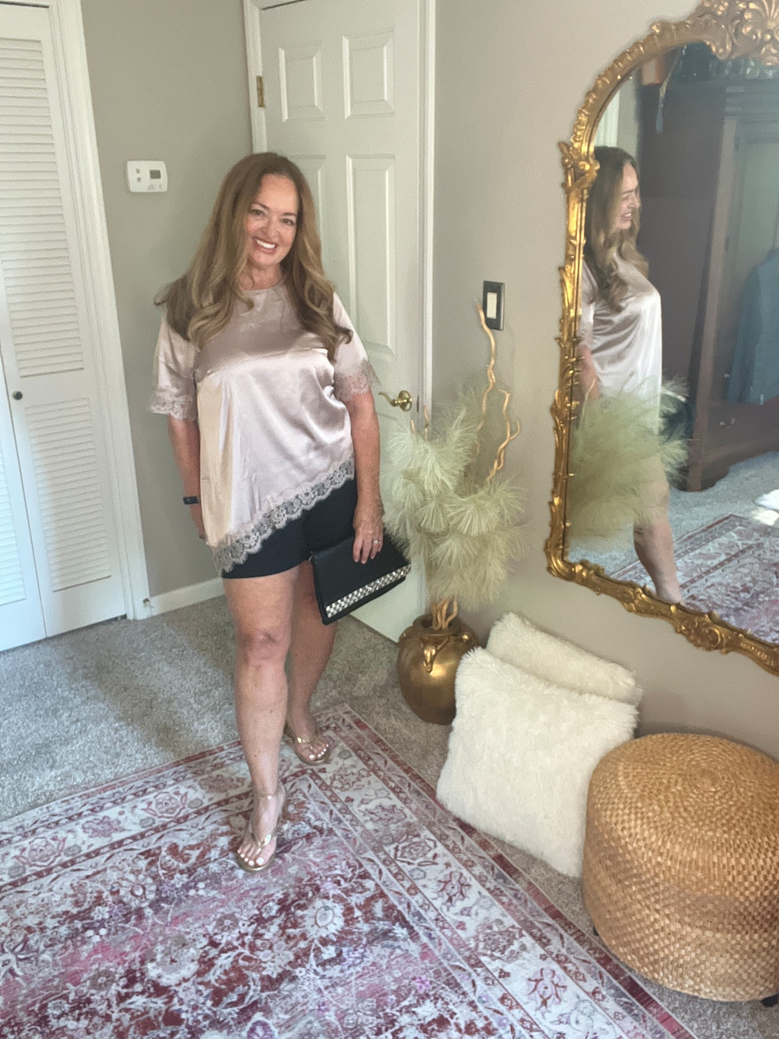 Satin blouse asymmetrical hem.

#LTKgrwm #LTKOver40 #LTKFestival