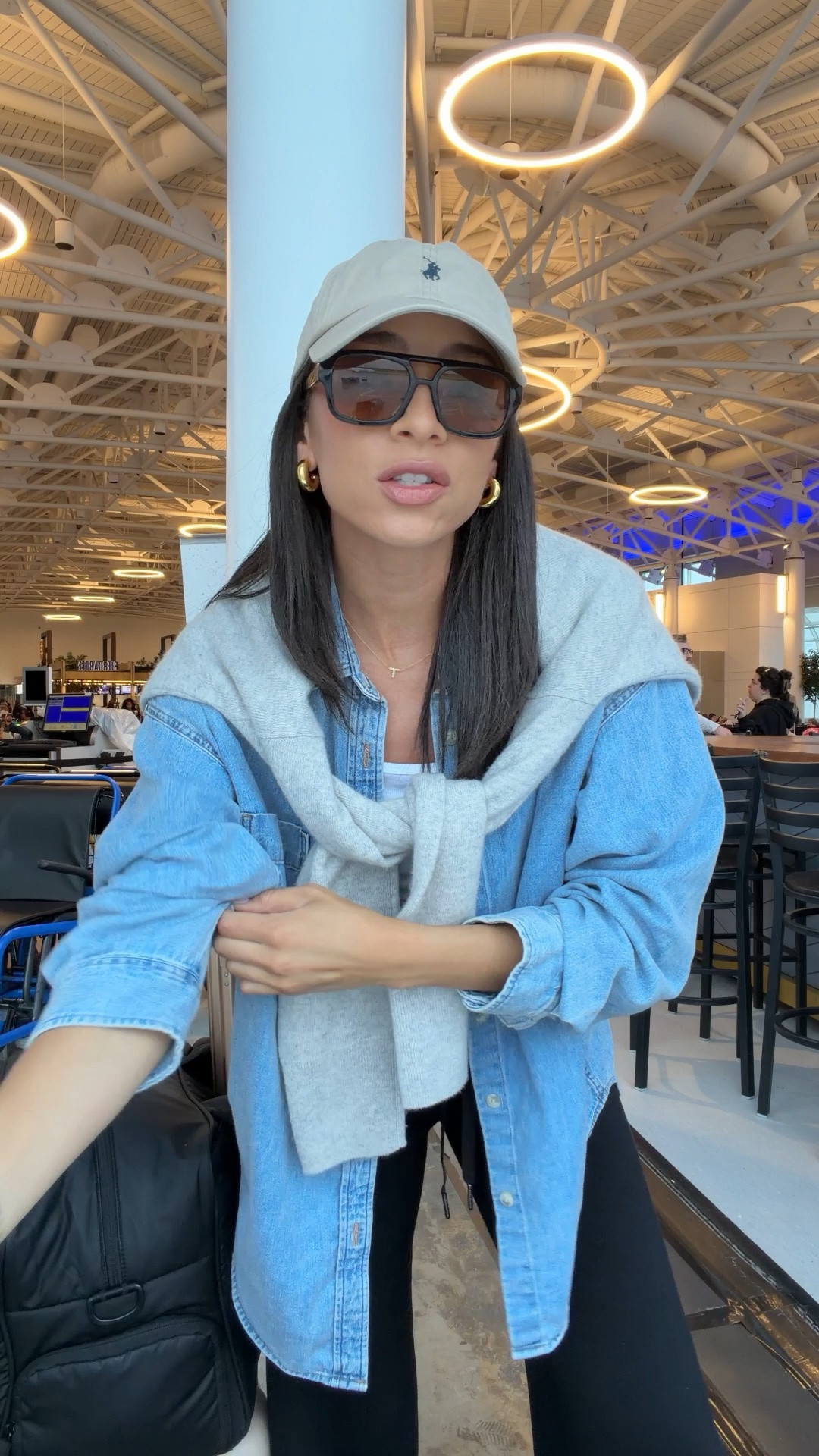 Airport outfit! The comfiest pants ever and the softest denim shirt make for a super cute and practical travel outfit ✈️ Use code NENAXSPANX for 15% off the pants - they are my most worn travel pants of all time! Size S Tall pants, S denim shirt, S tank, M sweater (sized up for oversized fit)

#LTKootd #LTKTravel