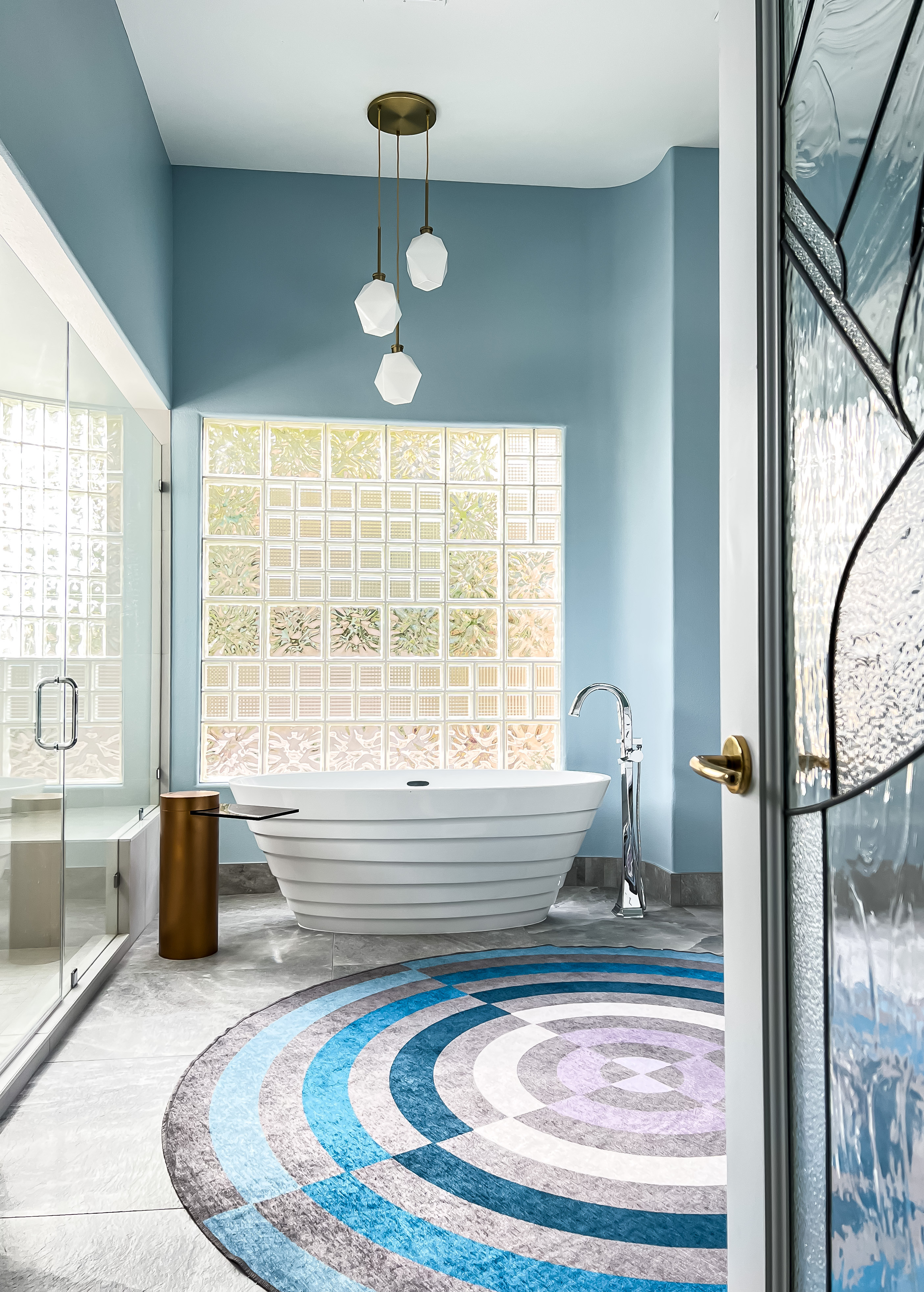 This serene bathroom is a dreamy blend of soft blues, clean lines, and sculptural details 🛁✨ I’ve rounded up lookalike items so you can recreate this spa-like vibe in your own home — from the modern freestanding tub to the geometric pendant lights, statement rug, and even the gold accent table!

Shop everything via my [LTK] — linked for you 💙 

 #BathroomInspo #ModernBath #FreestandingTub #LTKHome #LTKFinds #DressYourSpaceBySandraMijan #LTKHome #LTKStyleTip #LTKBeauty