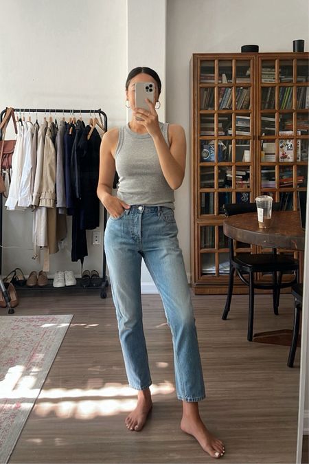 Minimal casual summer outfit 

Tank xs - linked similar styles 
Everlane jeans sized down vintage mid blue shortest ankle length - linked similar styles 

#LTKStyleTip #LTKSeasonal