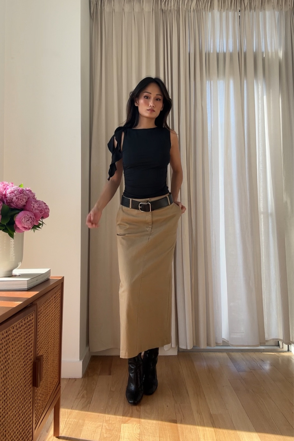 Spring outfit. Khaki skirt & boots! 

#LTKfit #LTKstyletip