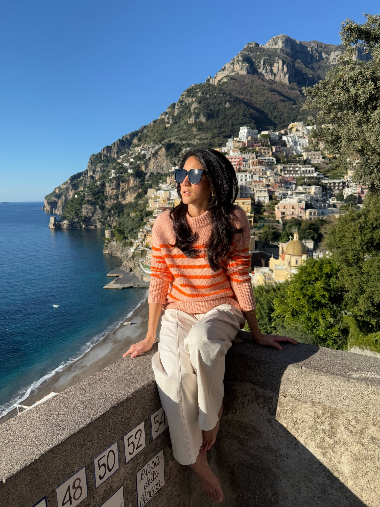 Spotted and cozied up in Positano. Little did I know that when we left Sorrento that morning I was going to be sweating underneath that sweater 😂 

Siempre había querido ir a Positano, desde que veía Under the Tuscan Sun 🤪 y fue soñado. Si van así sea en invierno lleven capas mas ligeras porque en el día puedes estar en camiseta. Me tocó caminar descalza en la playa para ventilarme! 

#LTKStyleTip