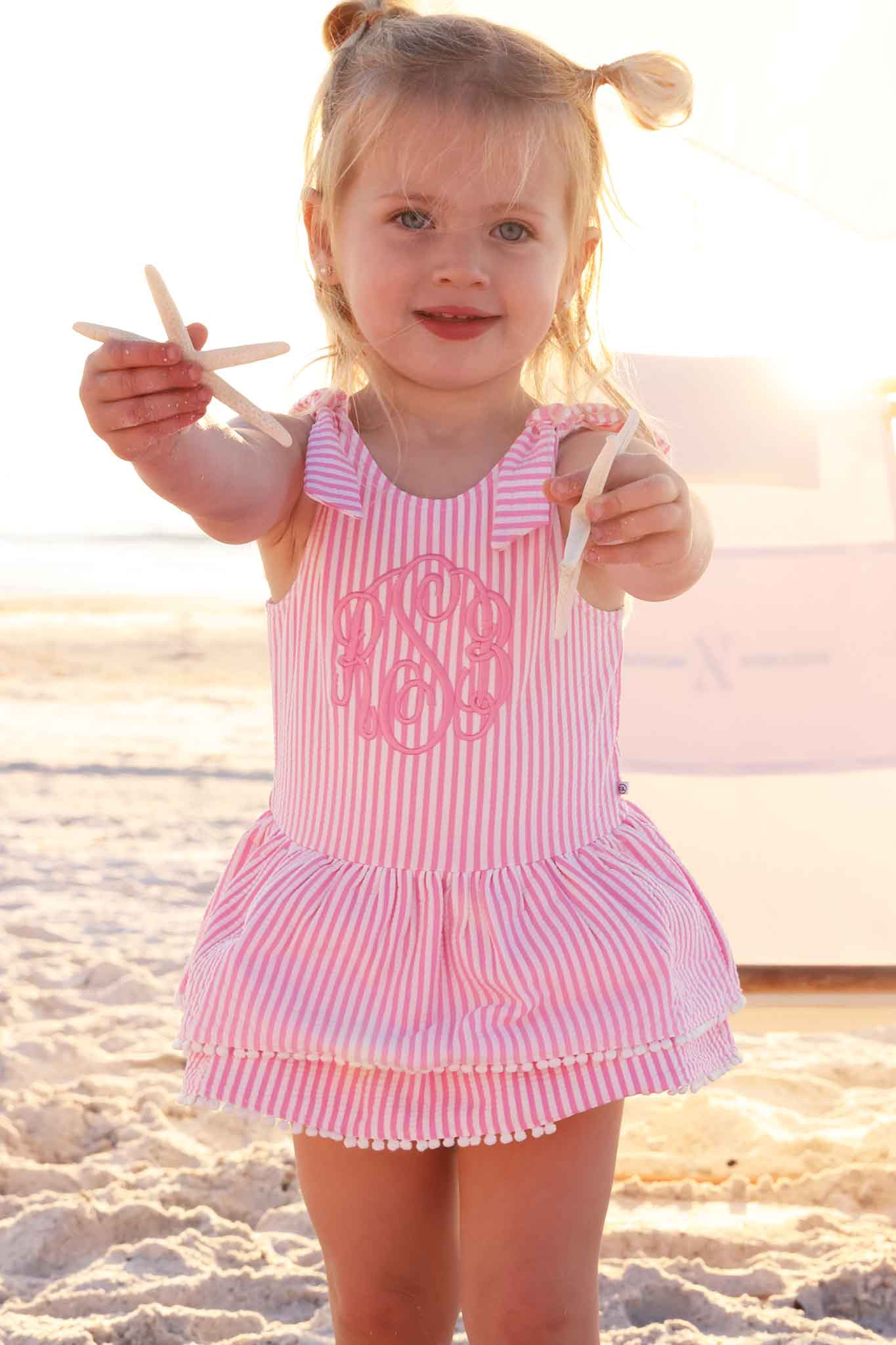 Tiered Skirt with White Pom Trim | Seersucker Dusty Pink | Caden Lane