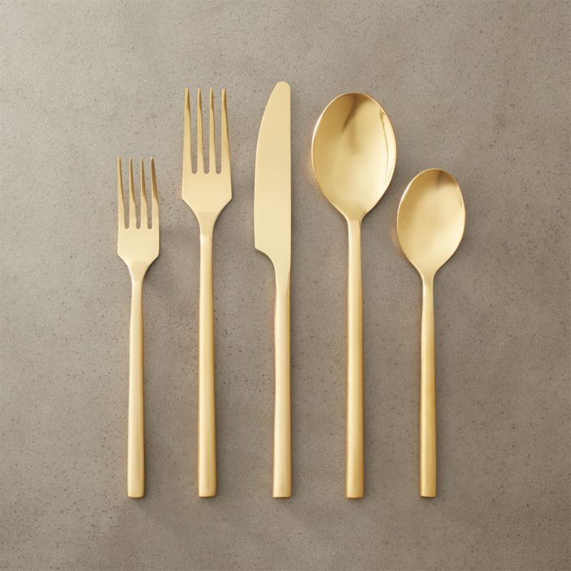 20-piece rush gold flatware set | CB2